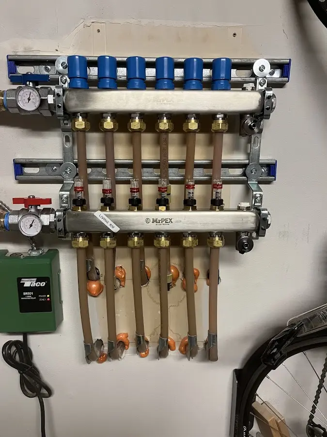 Plumber performing Gas Line Installation at a residential property in Kendall West